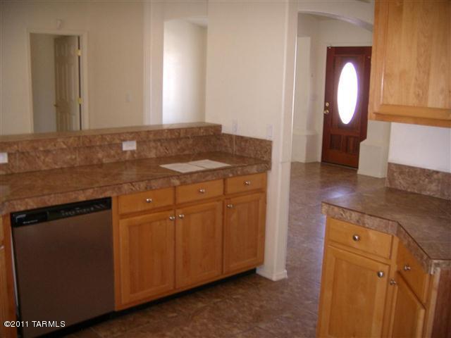 940 Paseo Escoba Rio Rico, AZ 85648 - Photo 3 of 25 a bathroom with a sink and a mirror