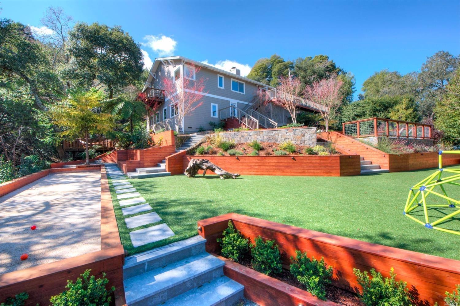 153 South Ridgewood Road Kentfield, CA 94904 - Photo 1 of 1 The impeccable balance between traditional and contemporary, with a custom built bamboo entry gate opening into a professionally crafted garden—designed by Ben Buettner—offers a wonderful first glance at the beauty of this property and architecture. The entry foyer warmly welcomes guests seamlessly into the formal public rooms. Immaculately renovated, the sunny, open floor plan provides the ideal living space, including the gourmet kitchen, family room, and outdoor patio and yard. This exclusive indoor-outdoor setting with beautiful, sunny views of the hills overlooks the expansiveness of the estate type property. Rare details of Santos Mahogany flooring, two wood burning and finely crafted fireplaces, a 500+ bottle wine cellar, and two car garage, truly make this home one-of-a-kind.