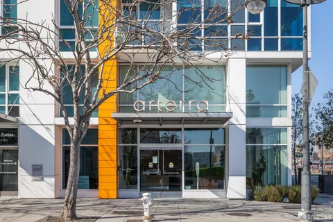 a view of a lobby with chair and tables