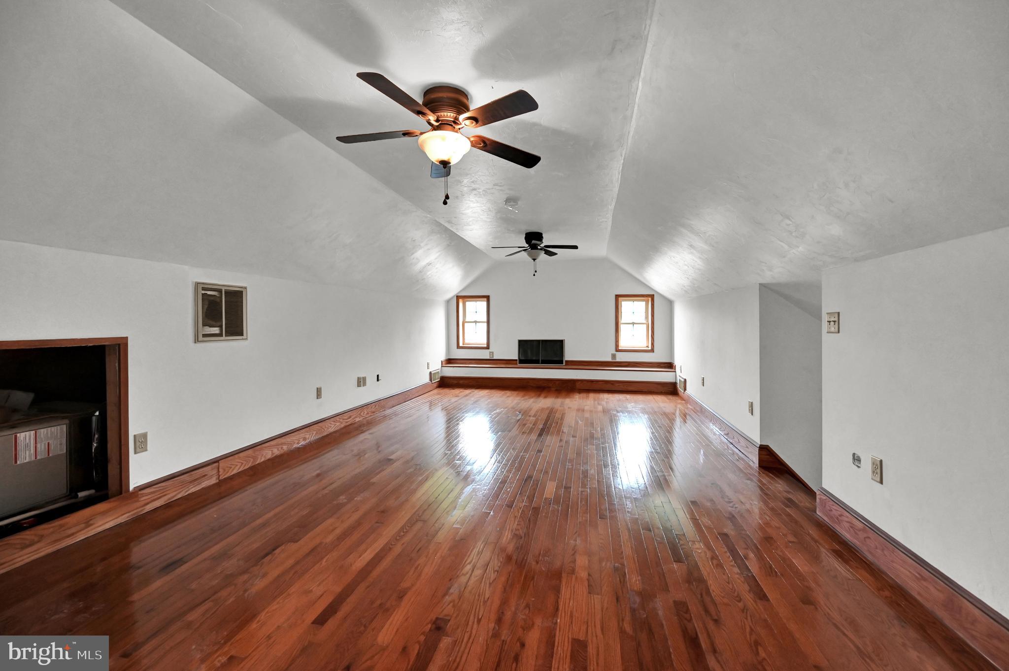 6800 Cannery Road Spring Grove, PA 17362 - Photo 15 of 23 a view of empty room with wooden floor and fan