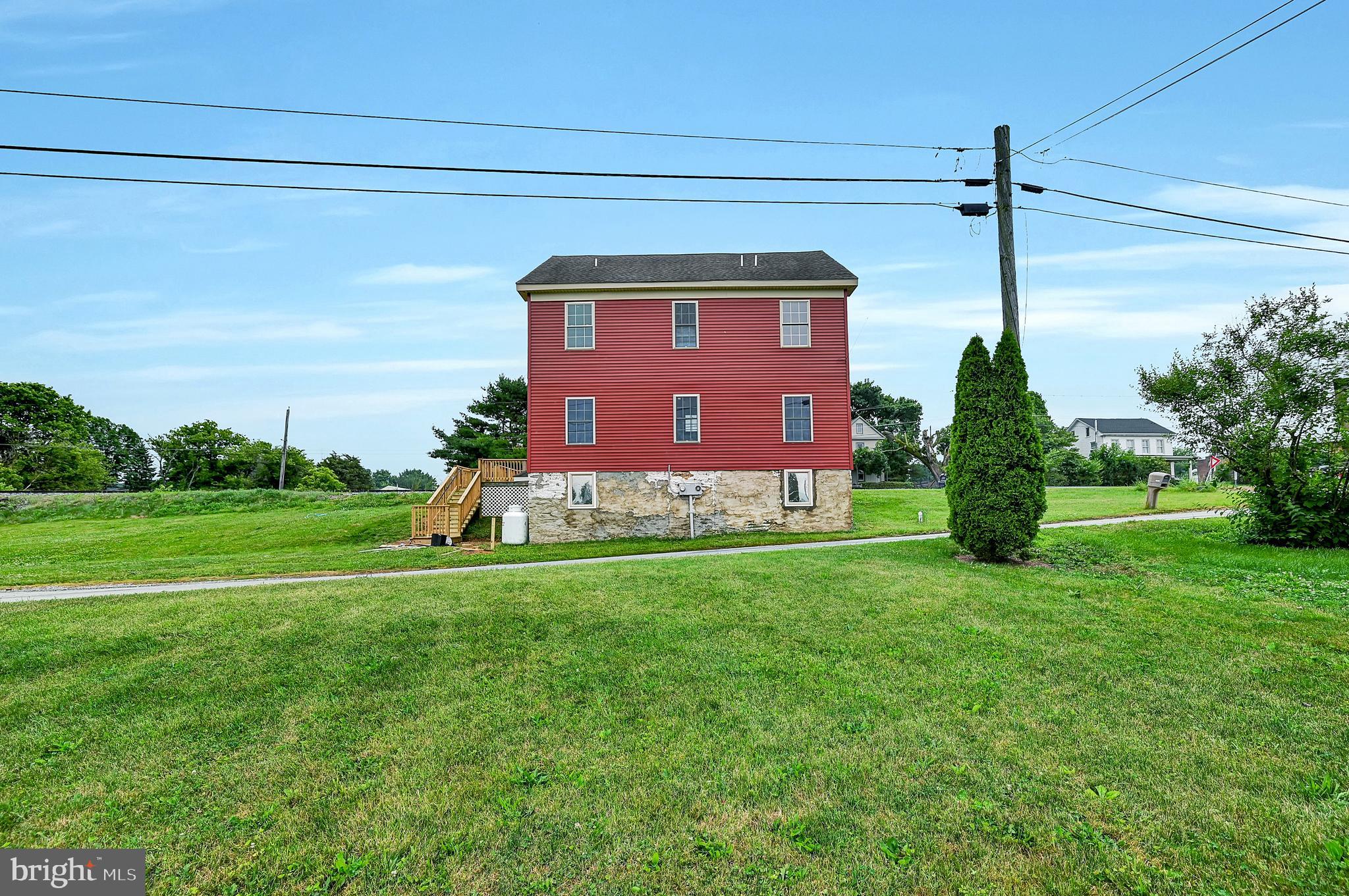 6800 Cannery Road Spring Grove, PA 17362 - Photo 20 of 23 a view of a house with a yard