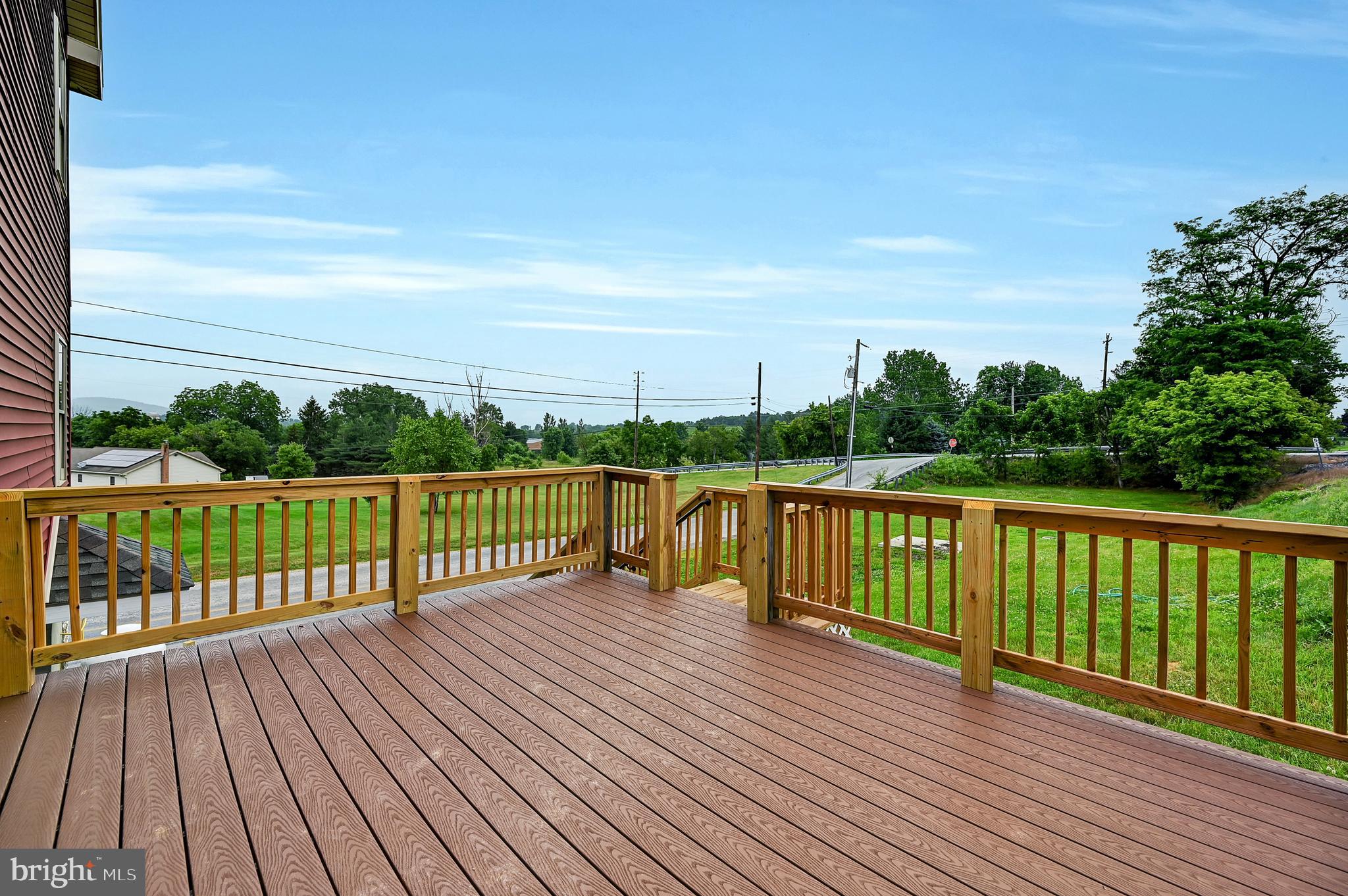 6800 Cannery Road Spring Grove, PA 17362 - Photo 23 of 23 a view of balcony with wooden floor & fence