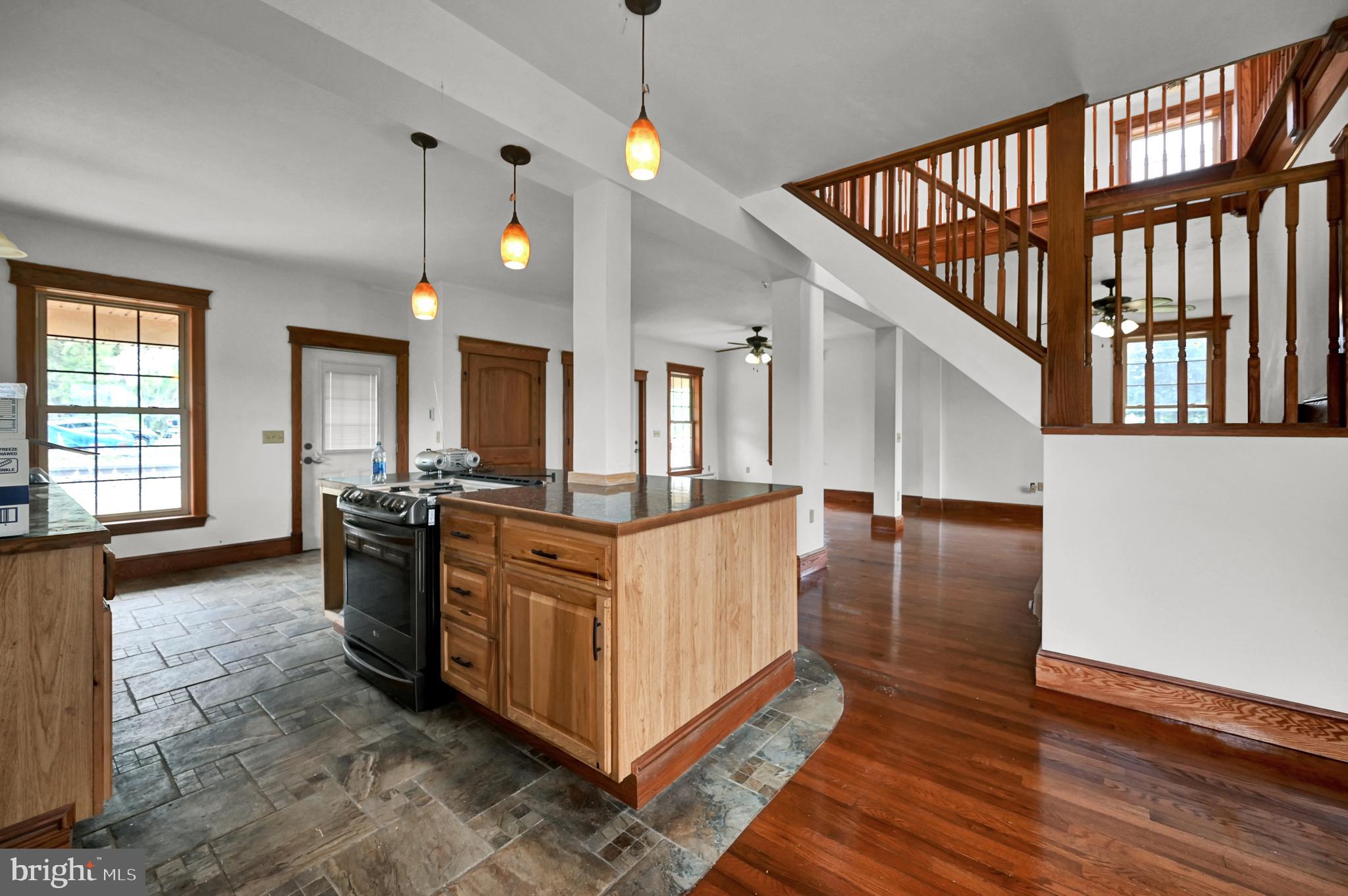 6800 Cannery Road Spring Grove, PA 17362 - Photo 3 of 23 a large hall with wooden floor and windows