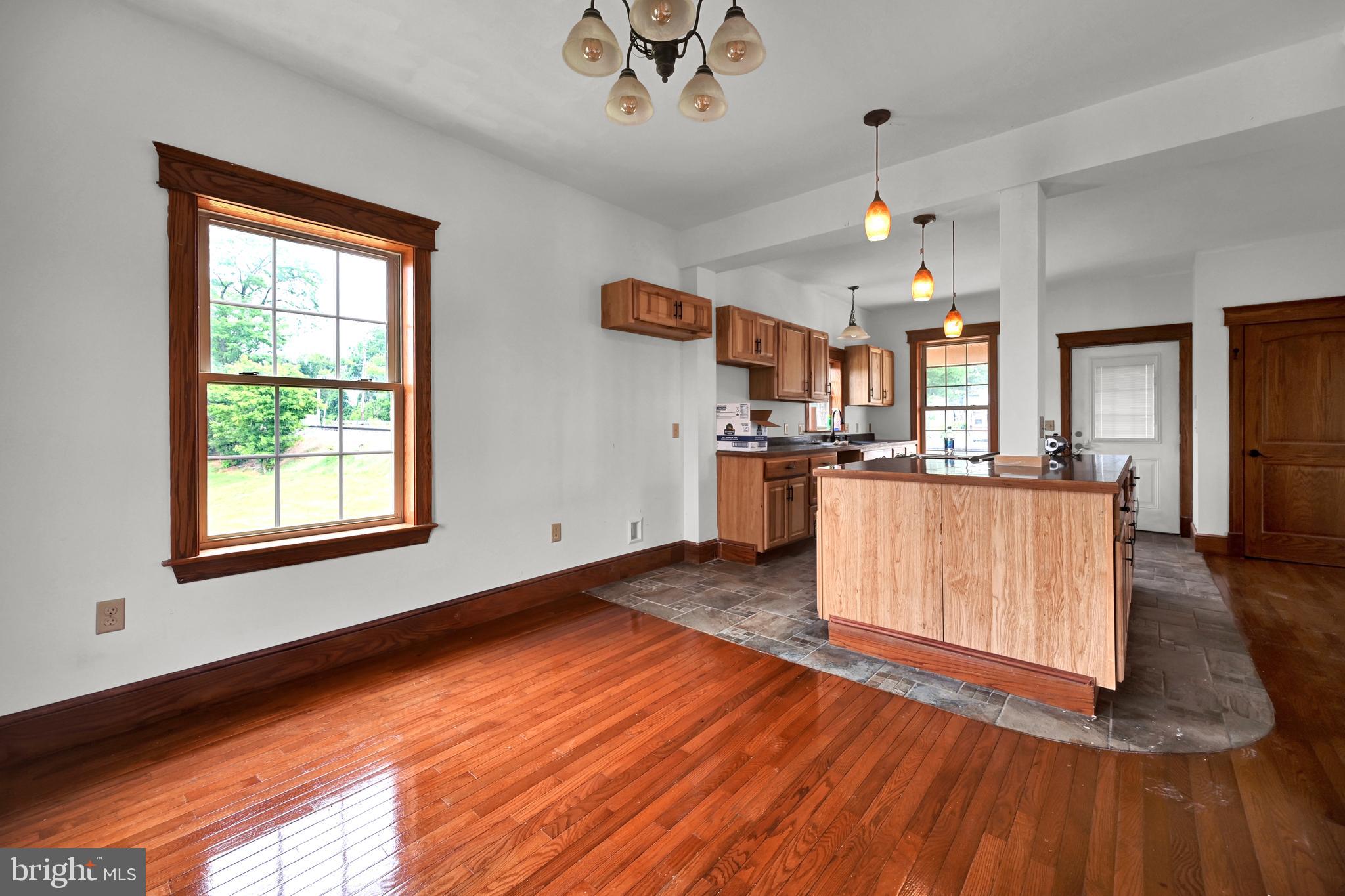 6800 Cannery Road Spring Grove, PA 17362 - Photo 6 of 23 a view of a kitchen with a sink and wooden floor