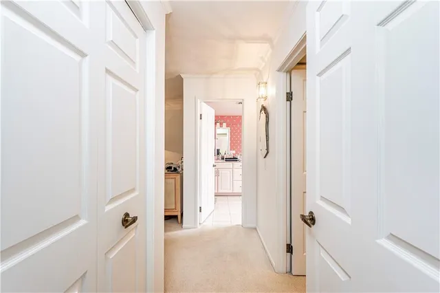 a en suite bathroom with a sink and a mirror