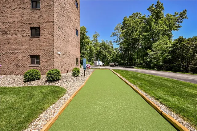 a view of balcony and yard