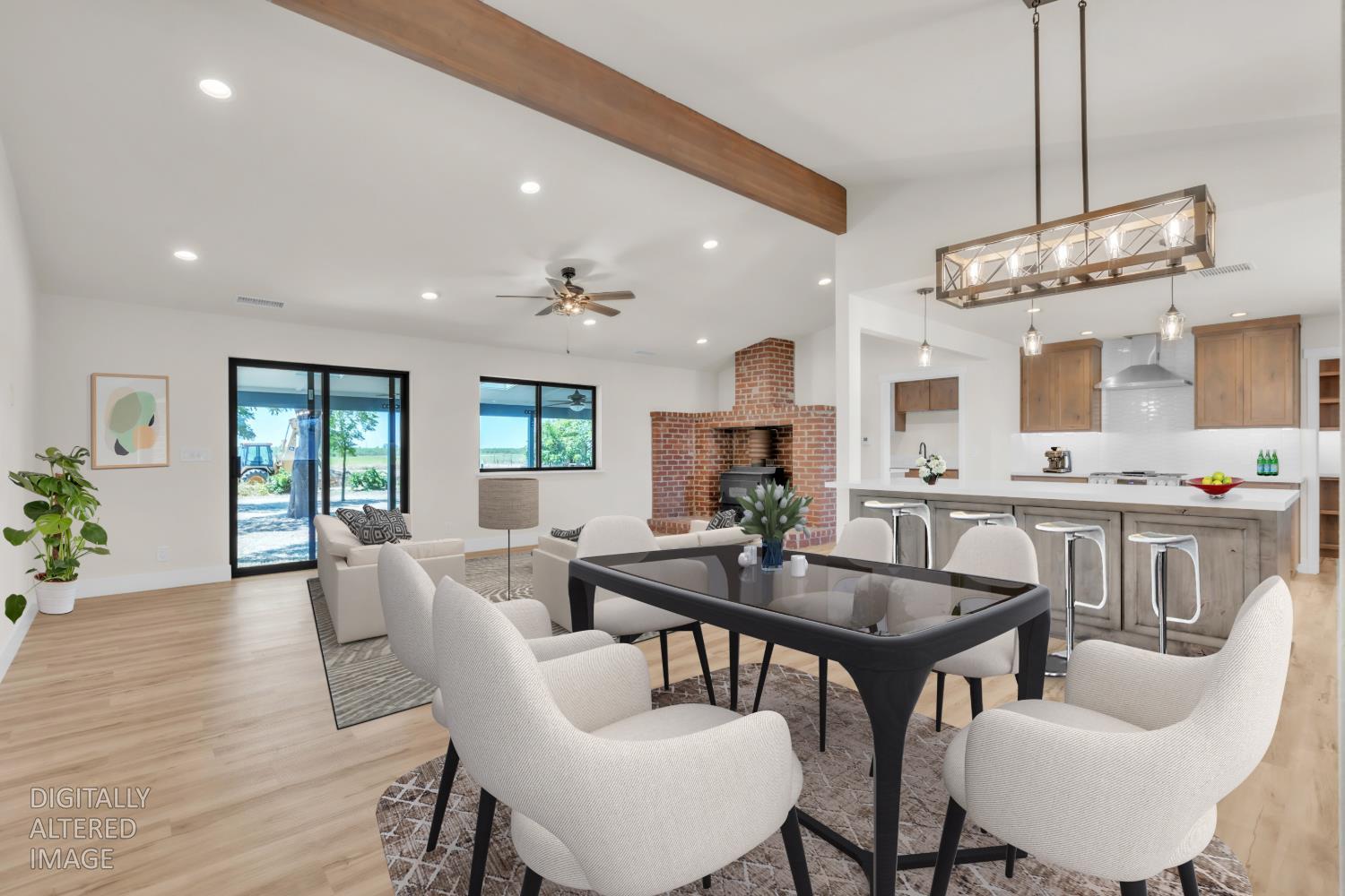 3559 Howsley Road Pleasant Grove, CA 95668 - Photo 23 of 61 a view of a dining room with furniture and wooden floor