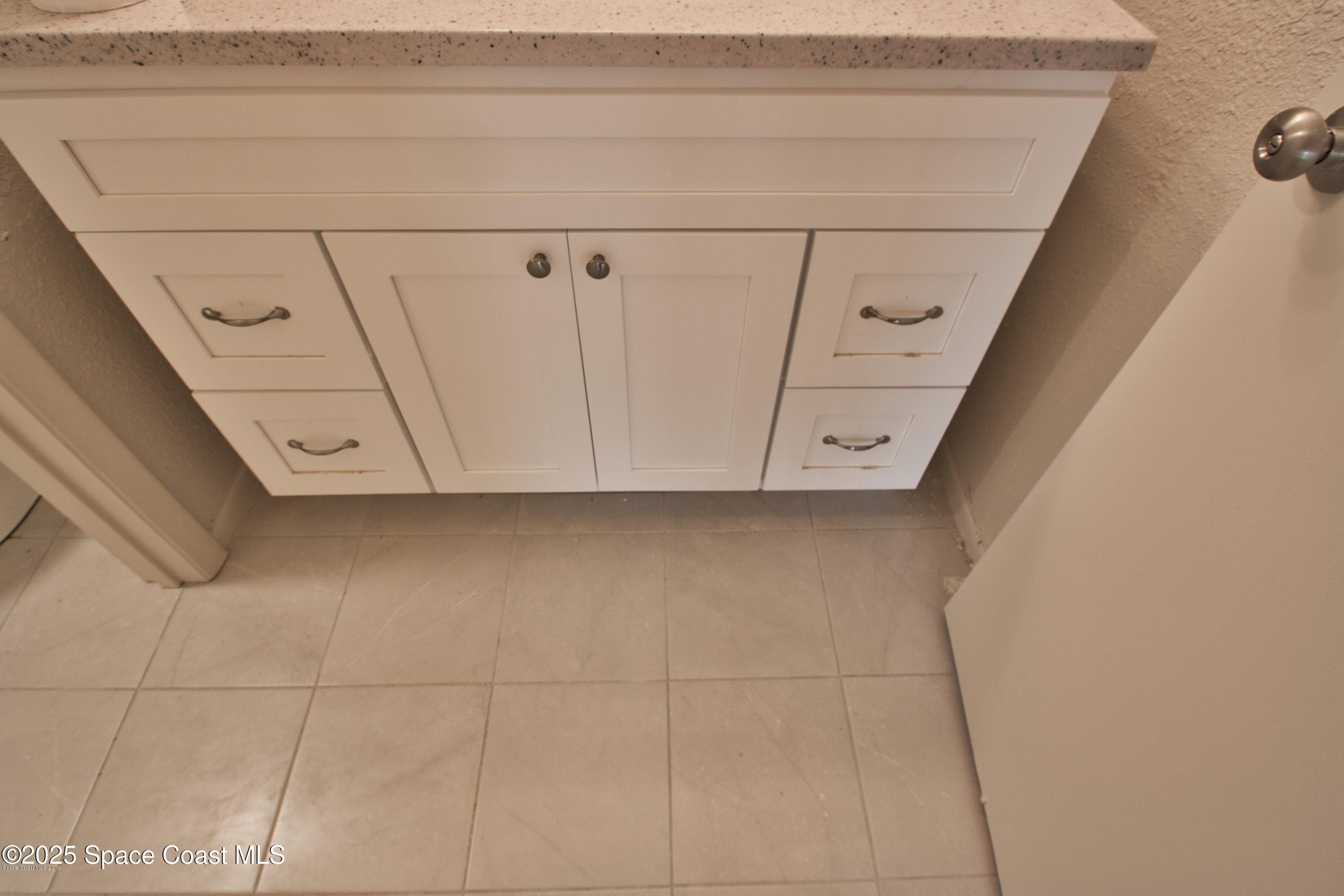 2550 Eagle Drive, Unit 3C Melbourne, FL 32935 - Photo 8 of 14 a view of a garage