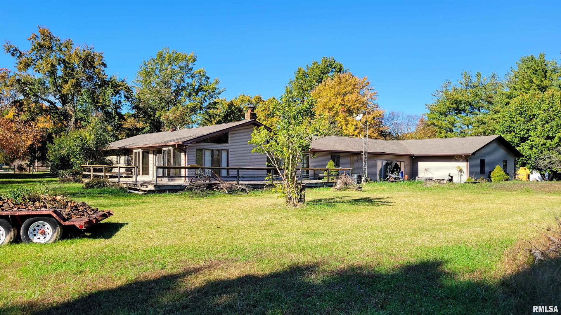 3898 Country Club Road Carbondale, IL 62901 - Photo 39 of 55 a view of a house with pool and a yard