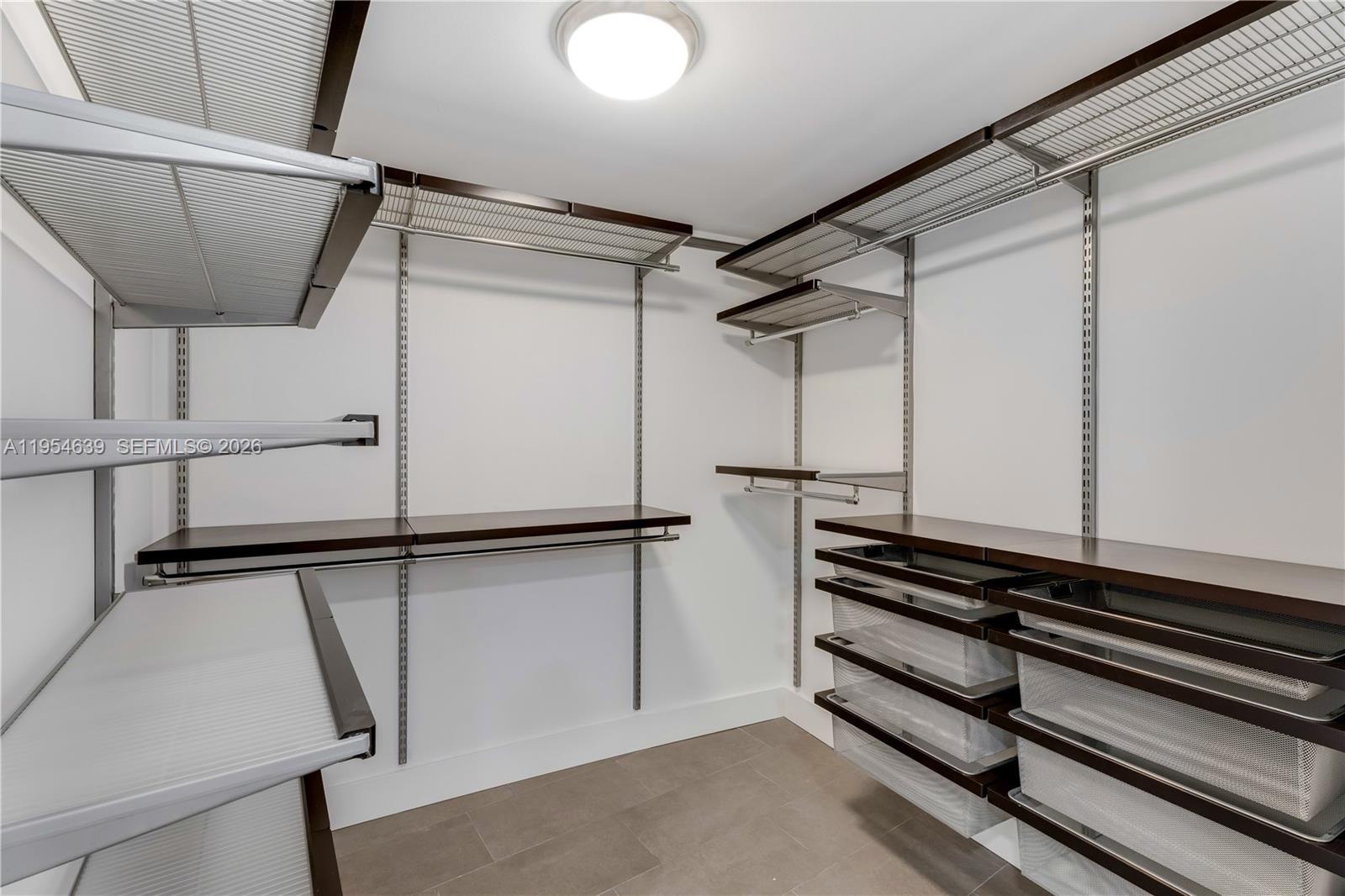 720 Northeast 69th Street, Unit 4S Miami, FL 33138 - Photo 18 of 46 a view of closet