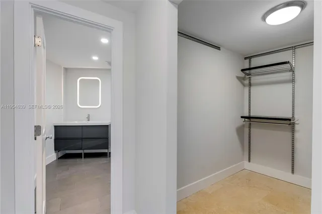 a bathroom with a toilet sink and bathtub