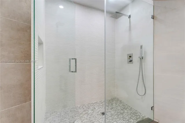 a view of a bathroom with a bathtub and a sink