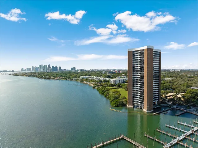 a view of a lake with a city