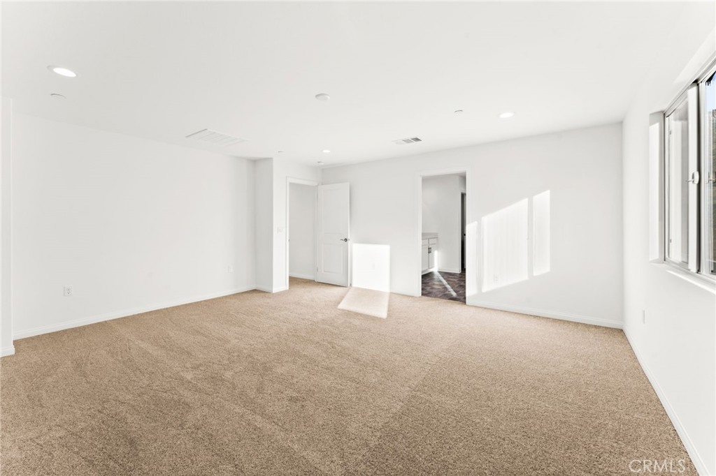 8465 Anthony Street Colton, CA 92324 - Photo 13 of 43 a view of empty room with windows