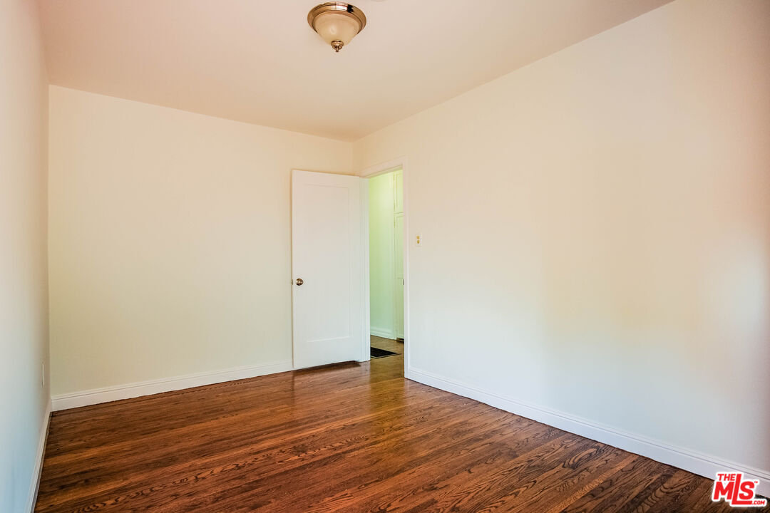 3564 Dover Street Los Angeles, CA 90039 - Photo 14 of 22 a view of empty room with wooden floor