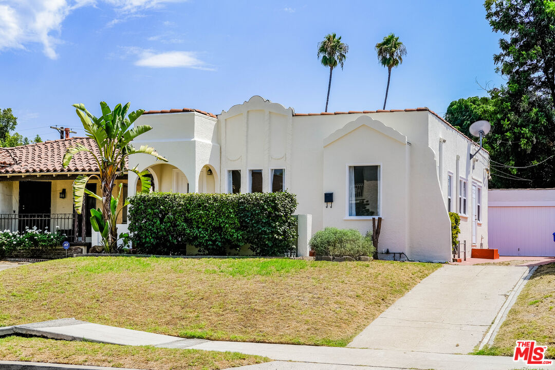 3564 Dover Street Los Angeles, CA 90039 - Photo 2 of 22 a front view of a house with a yard