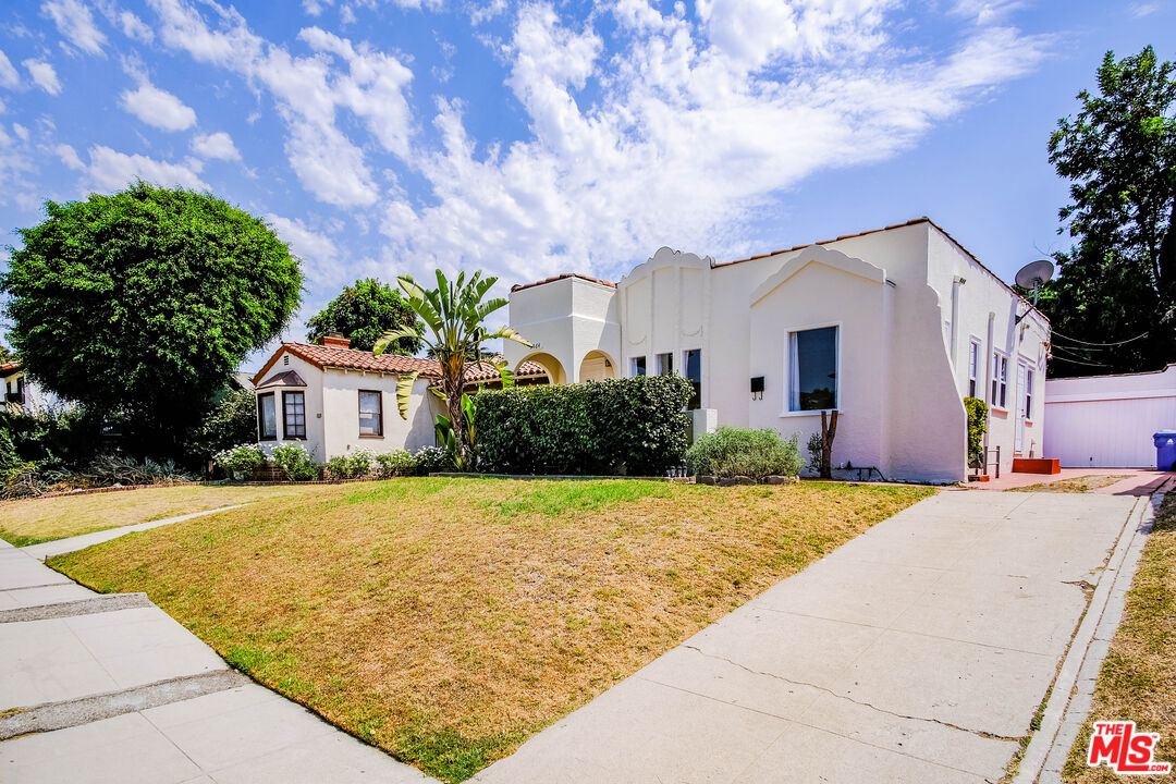 3564 Dover Street Los Angeles, CA 90039 - Photo 22 of 22 a front view of a house with yard and trees