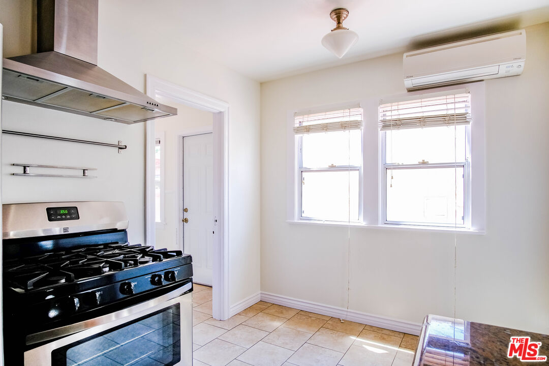 3564 Dover Street Los Angeles, CA 90039 - Photo 8 of 22 a kitchen with a stove and a window