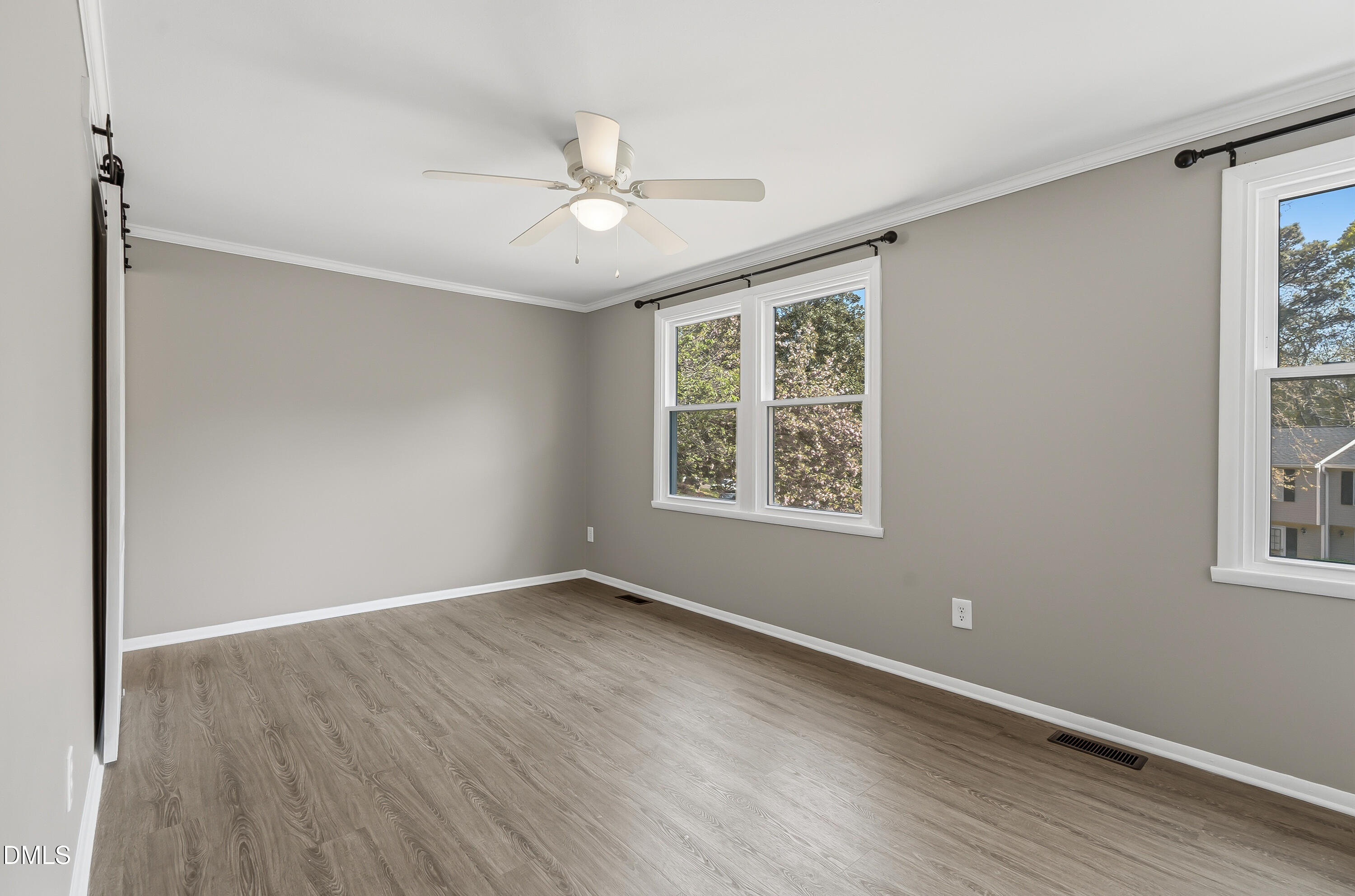 7715 Ohmann Court Raleigh, NC 27615 - Photo 21 of 36 Primary Bedroom