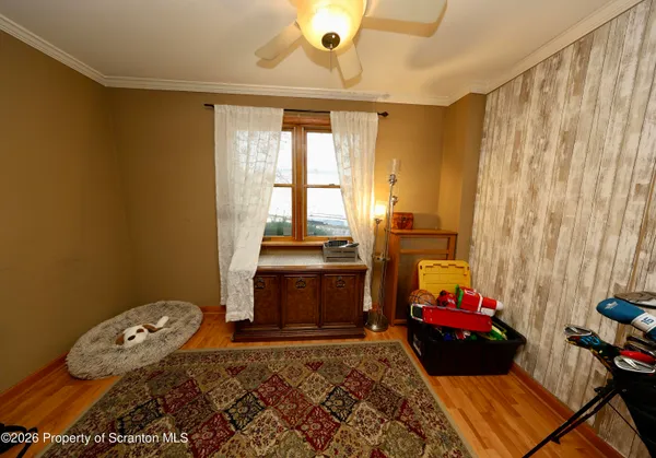 a bed room with a bed and a window