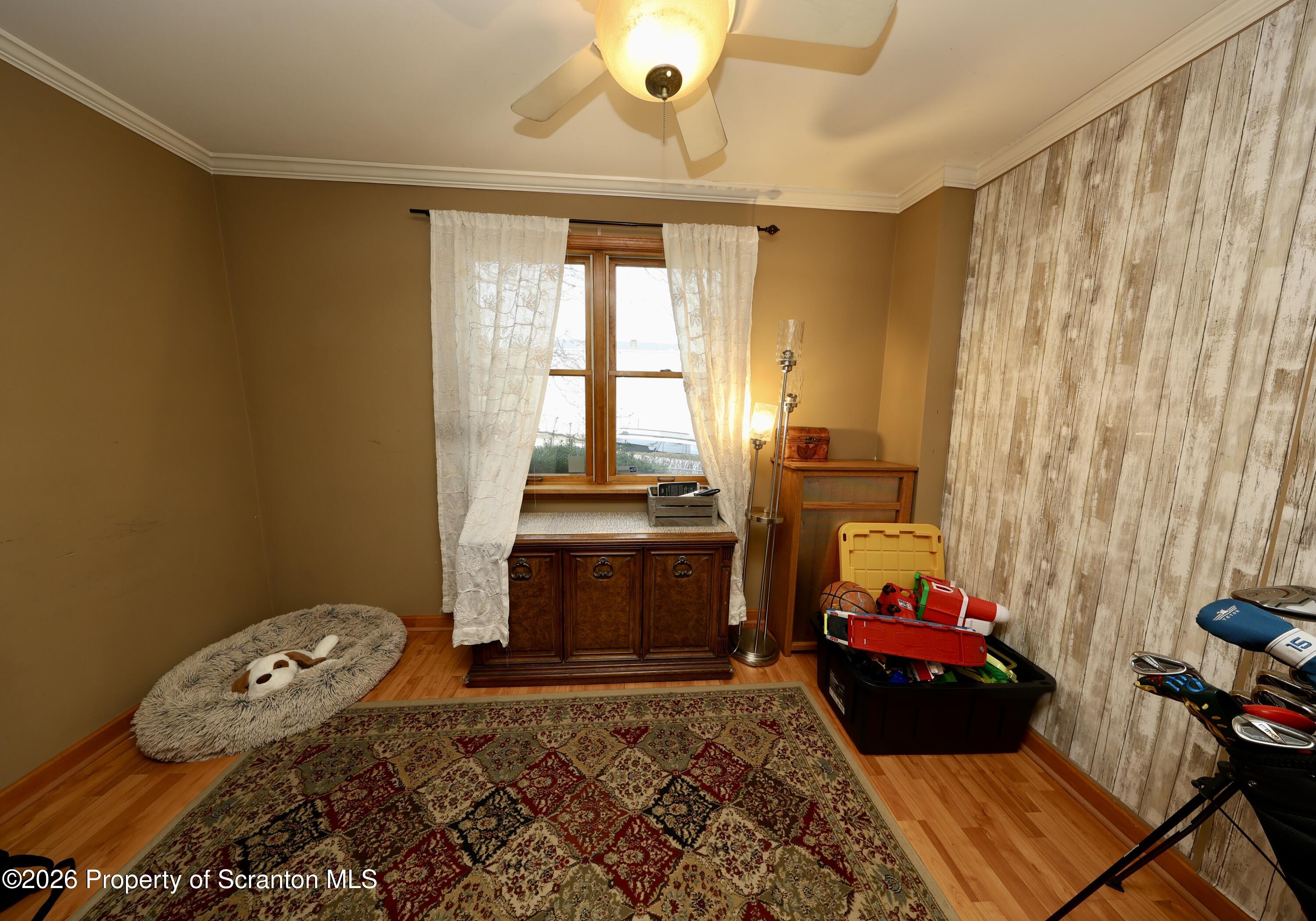 1338 Lafayette Street Scranton, PA 18504 - Photo 12 of 31 a bed room with a bed and a window