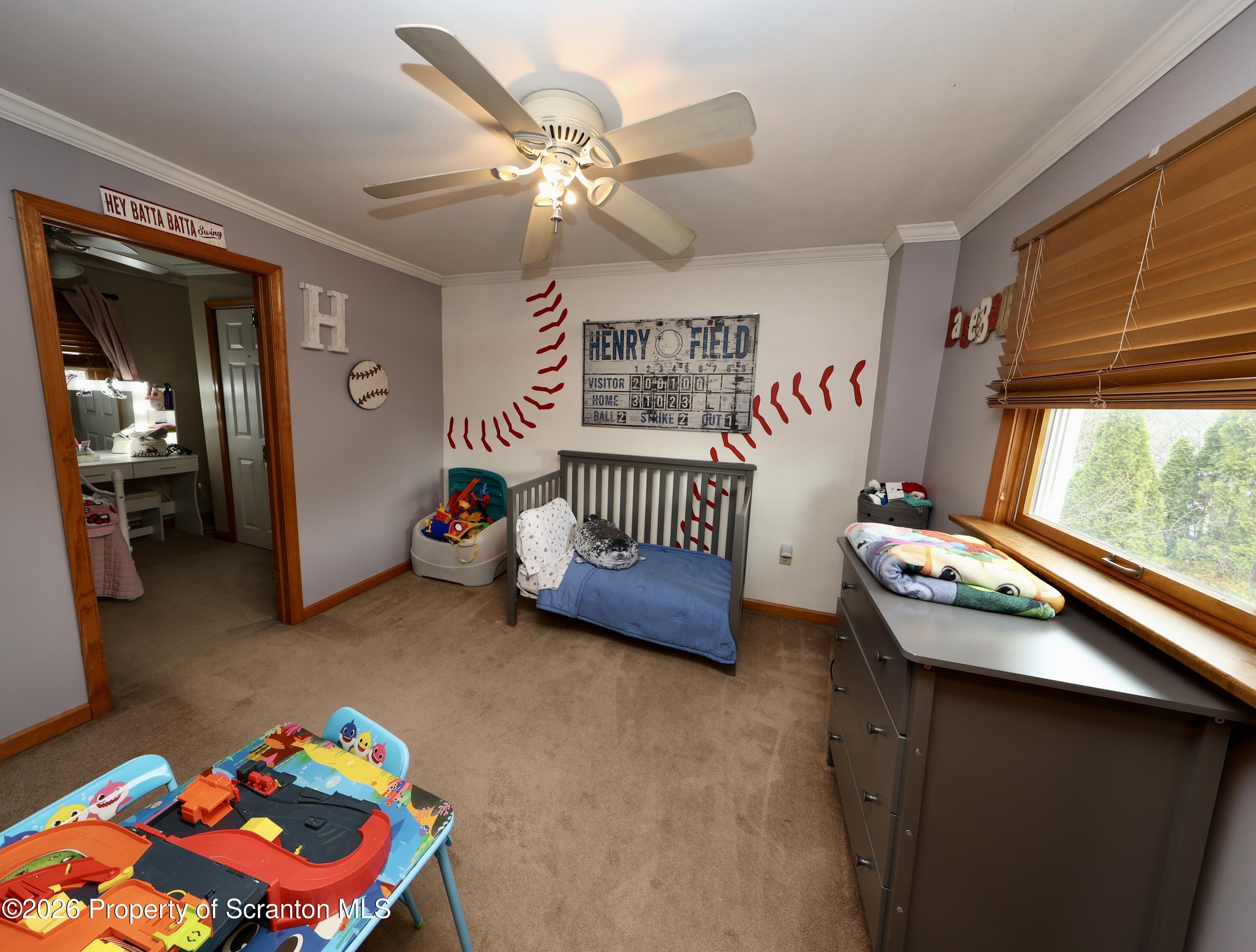 1338 Lafayette Street Scranton, PA 18504 - Photo 19 of 31 a bedroom with furniture and a window