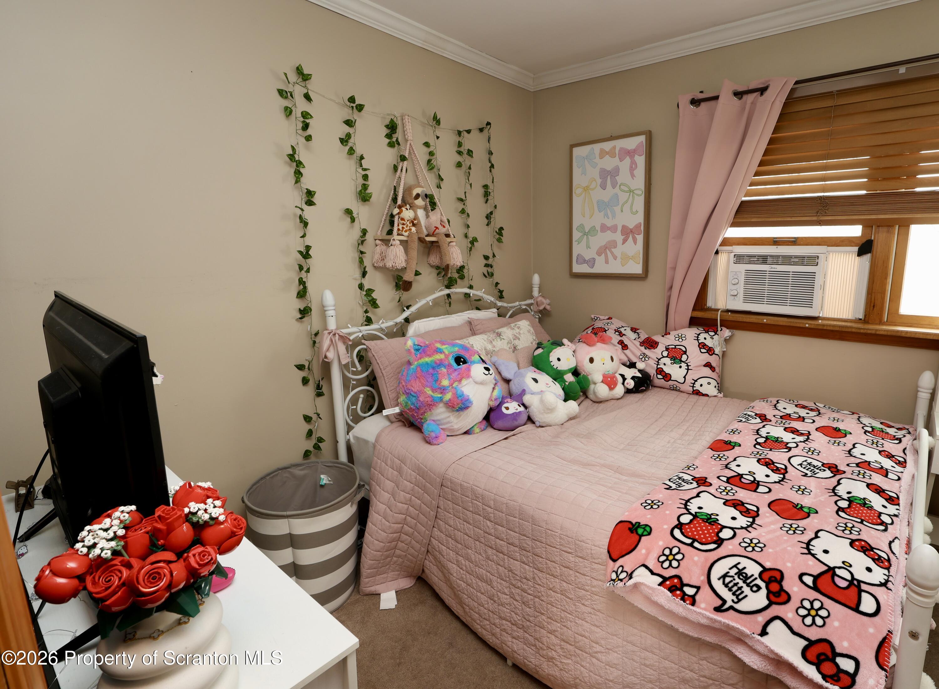 1338 Lafayette Street Scranton, PA 18504 - Photo 21 of 31 a bedroom with a bed and a dresser