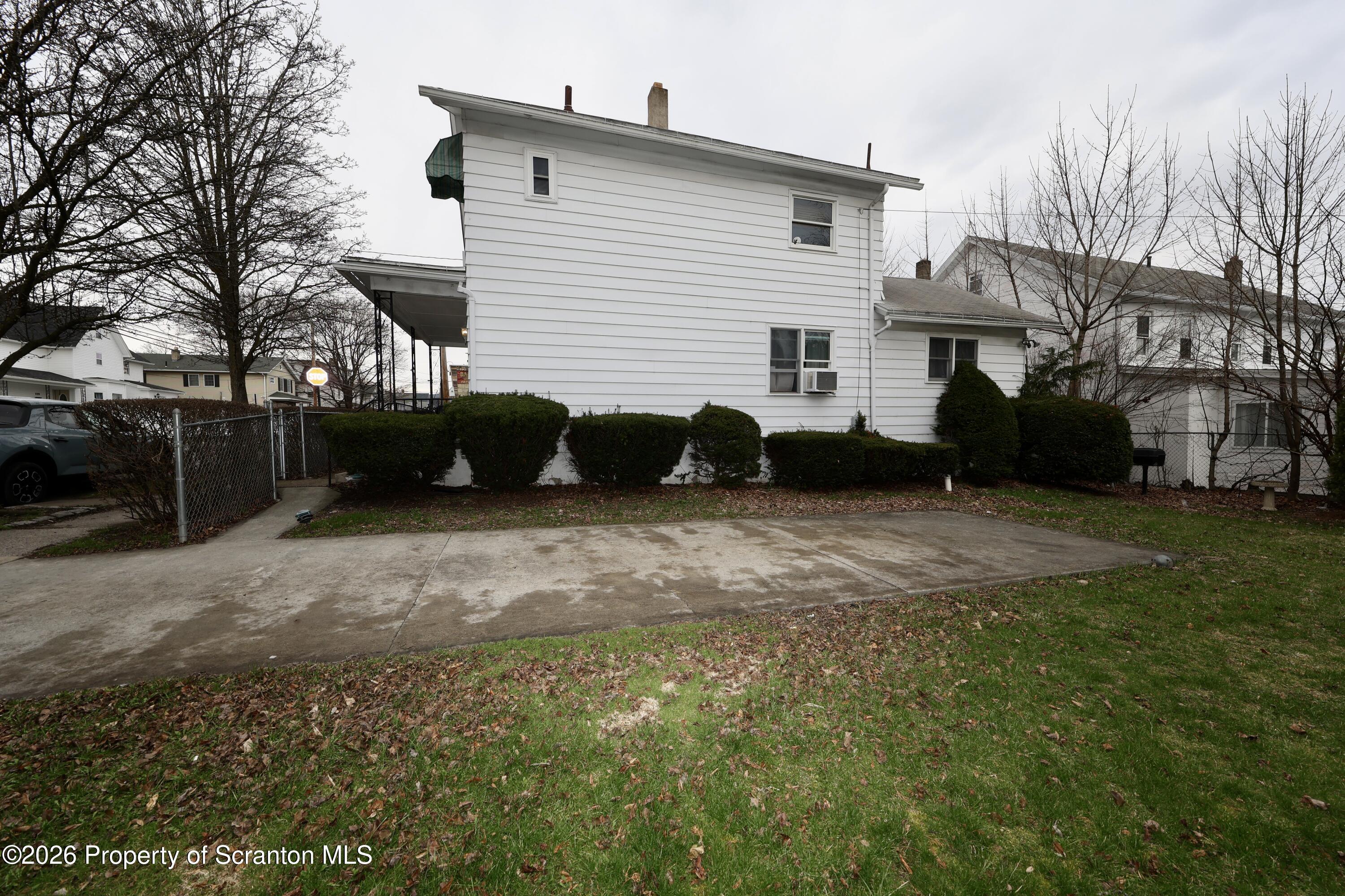 1338 Lafayette Street Scranton, PA 18504 - Photo 25 of 31 a view of a house with a yard