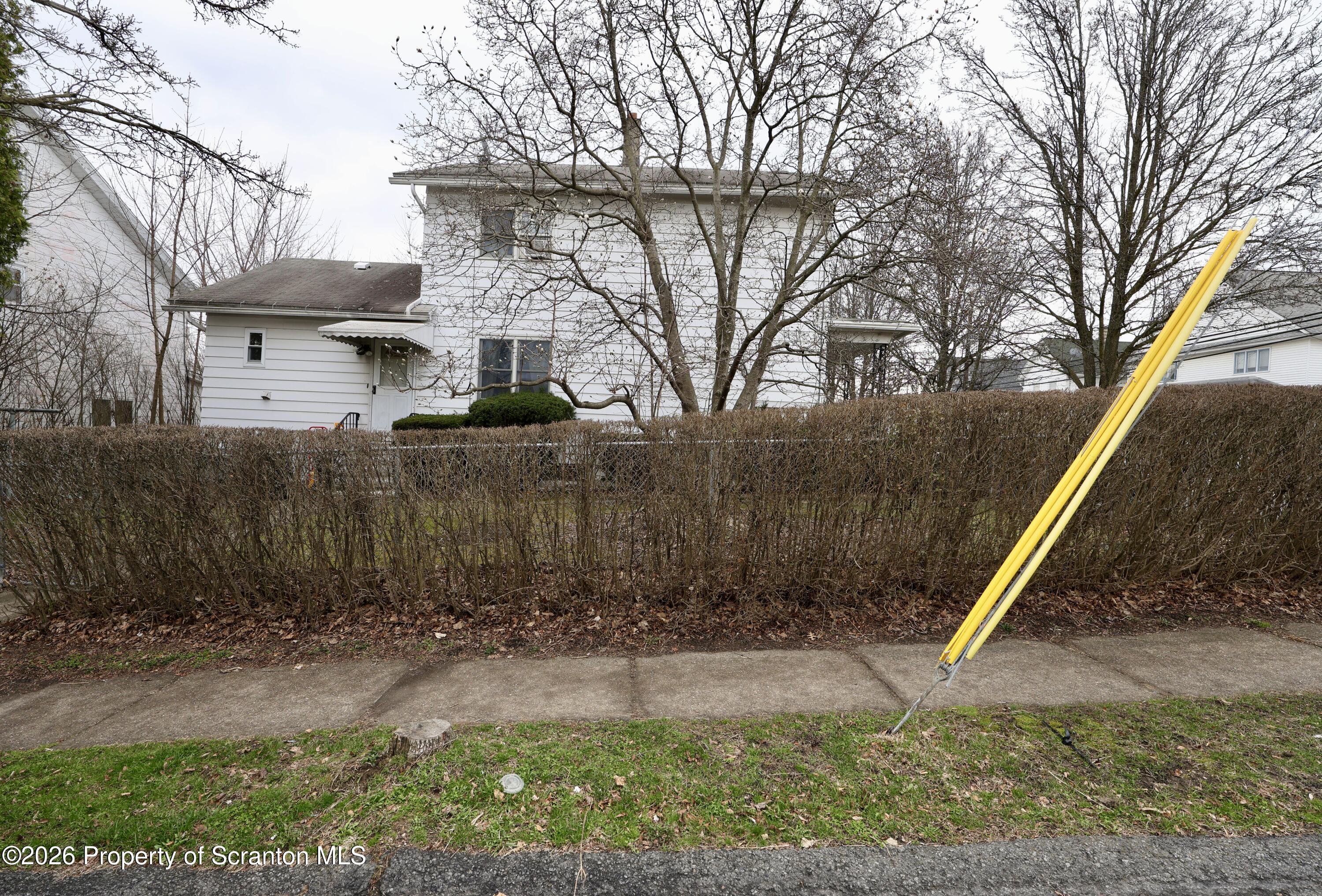 1338 Lafayette Street Scranton, PA 18504 - Photo 29 of 31 front view of a house with a yard