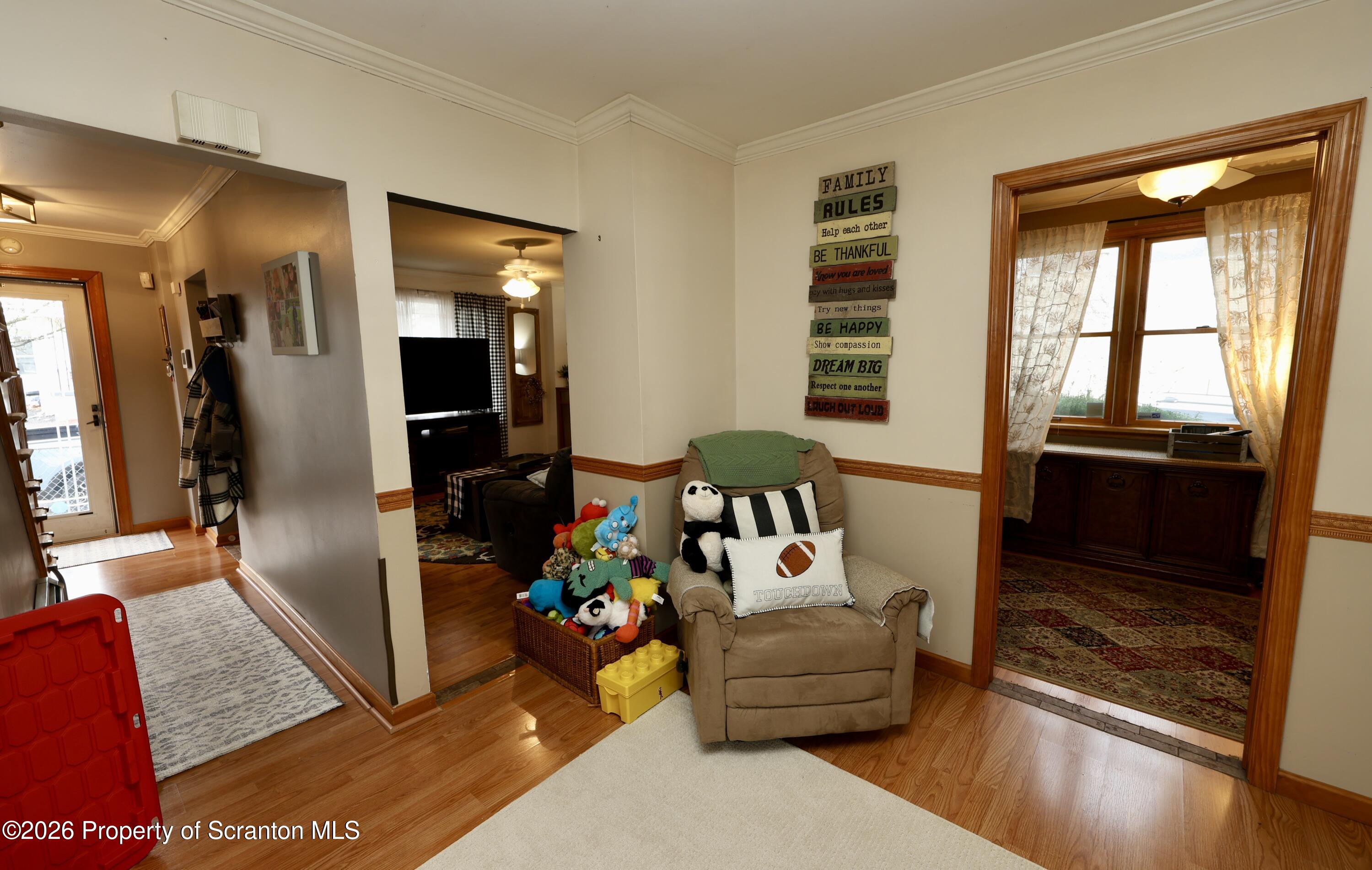 1338 Lafayette Street Scranton, PA 18504 - Photo 3 of 31 a living room with furniture and a window
