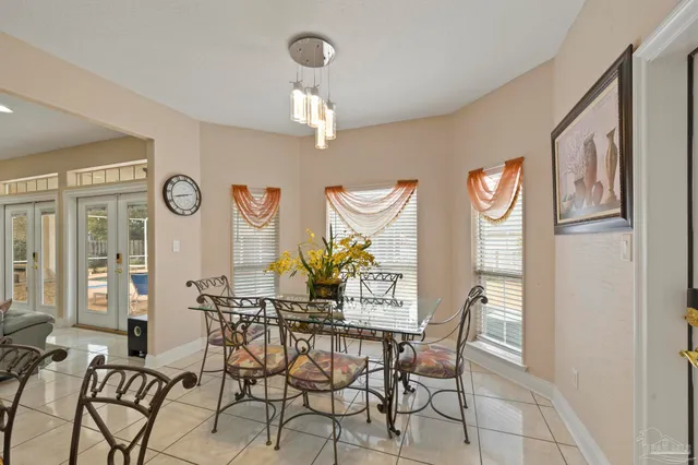 a living room with fireplace furniture and a flat screen tv
