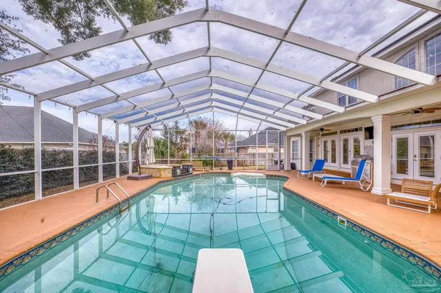 a view of a swimming pool with a patio