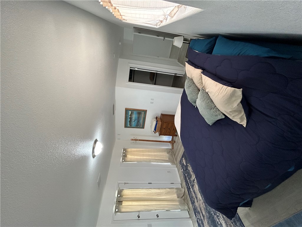 2191 Seneca Street Kingman, AZ 86401 - Photo 19 of 26 a bedroom with a bed and window