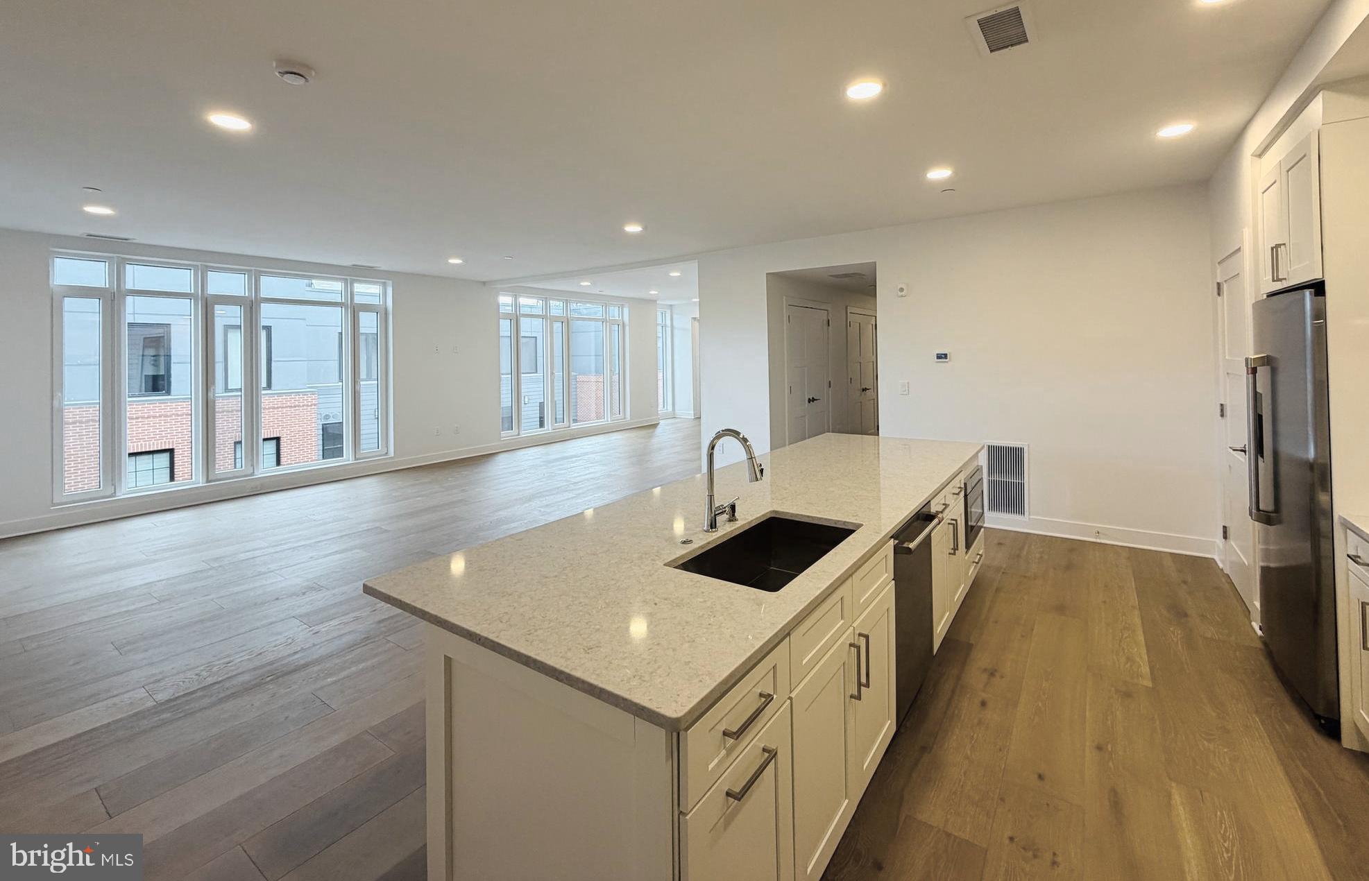 208 2nd Street East, Unit 402 Frederick, MD 21701 - Photo 6 of 20 Kitchen Island