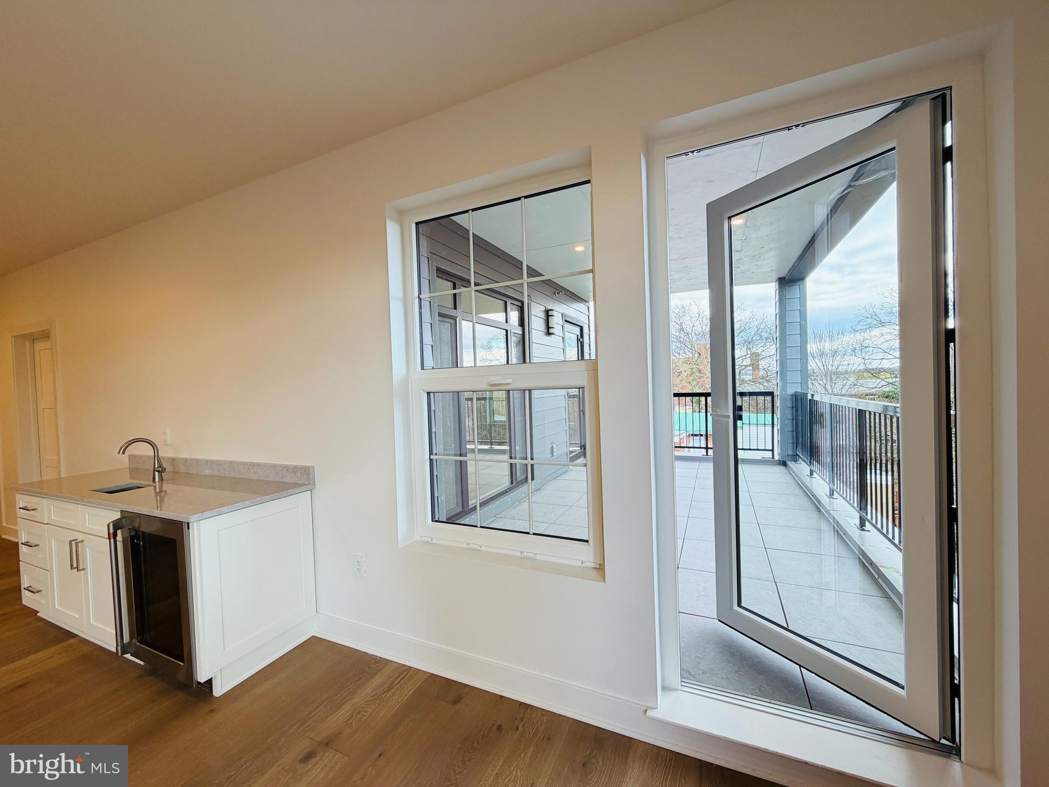 208 2nd Street East, Unit 402 Frederick, MD 21701 - Photo 9 of 20 Wet Bar/Balcony