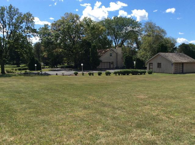 8S220 College Road Naperville, IL 60540 - Photo 11 of 20 a view of a swimming pool and trees in the background