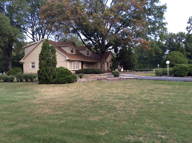 8S220 College Road Naperville, IL 60540 - Photo 18 of 20 a view of outdoor space with garden and trees