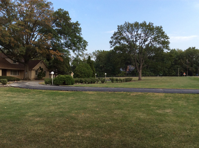 8S220 College Road Naperville, IL 60540 - Photo 20 of 20 a view of a green field with trees