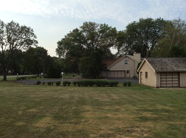 8S220 College Road Naperville, IL 60540 - Photo 9 of 20 a view of a house with a yard
