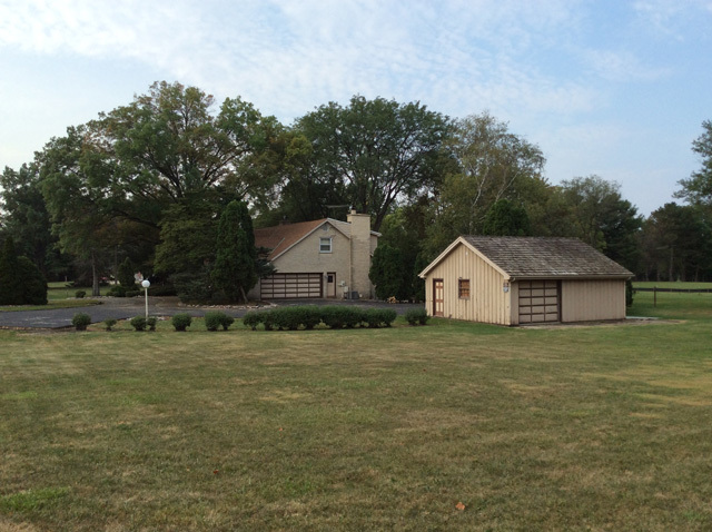 8S220 College Road Naperville, IL 60540 - Photo 10 of 20 a house with a yard