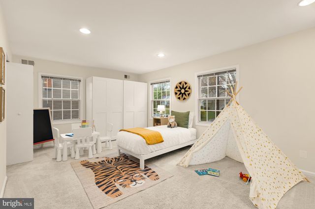 a view of a hallway with a bedroom