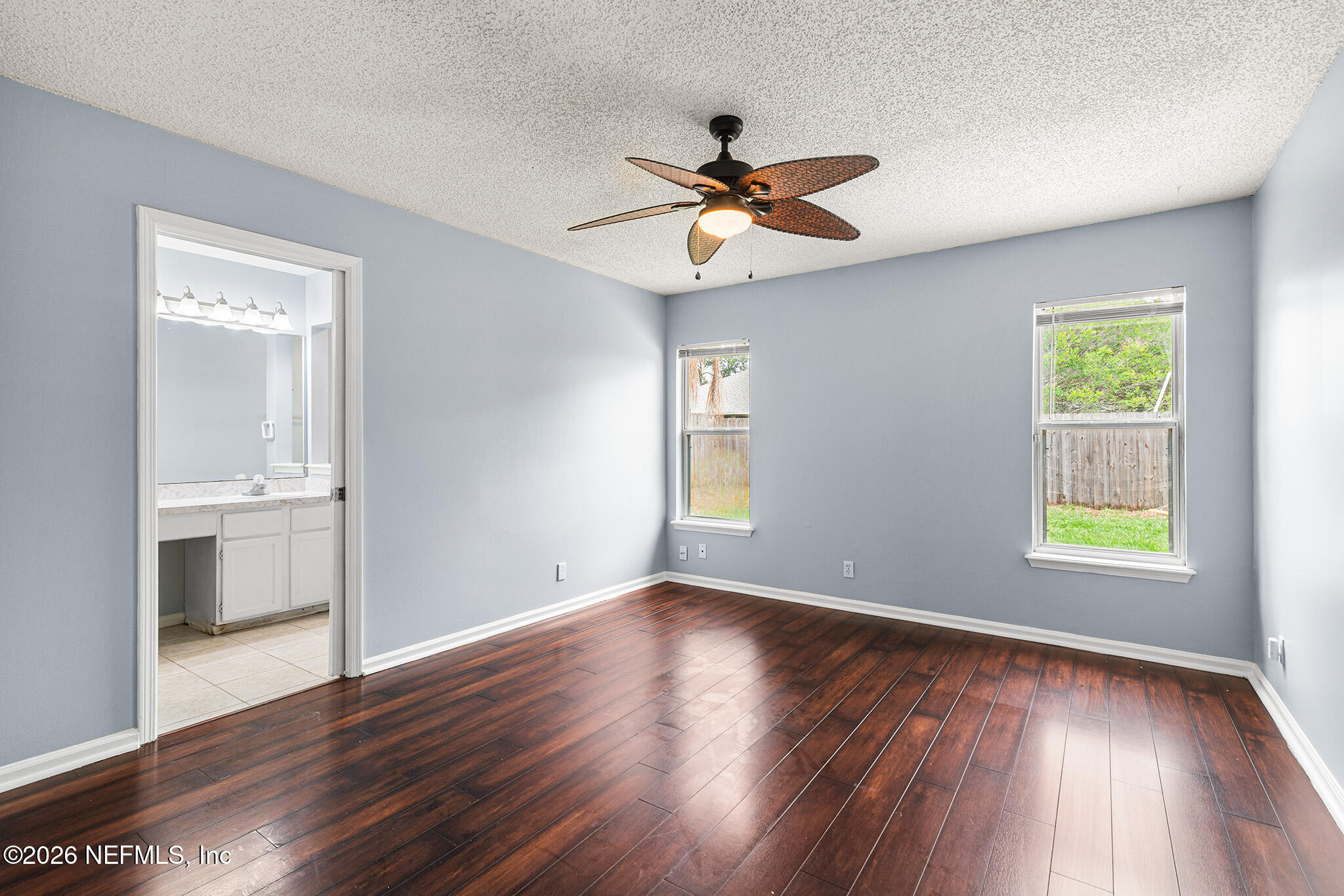 2020 Merced Court Jacksonville, FL 32224 - Photo 15 of 29 a view of an empty room with window and wooden floor
