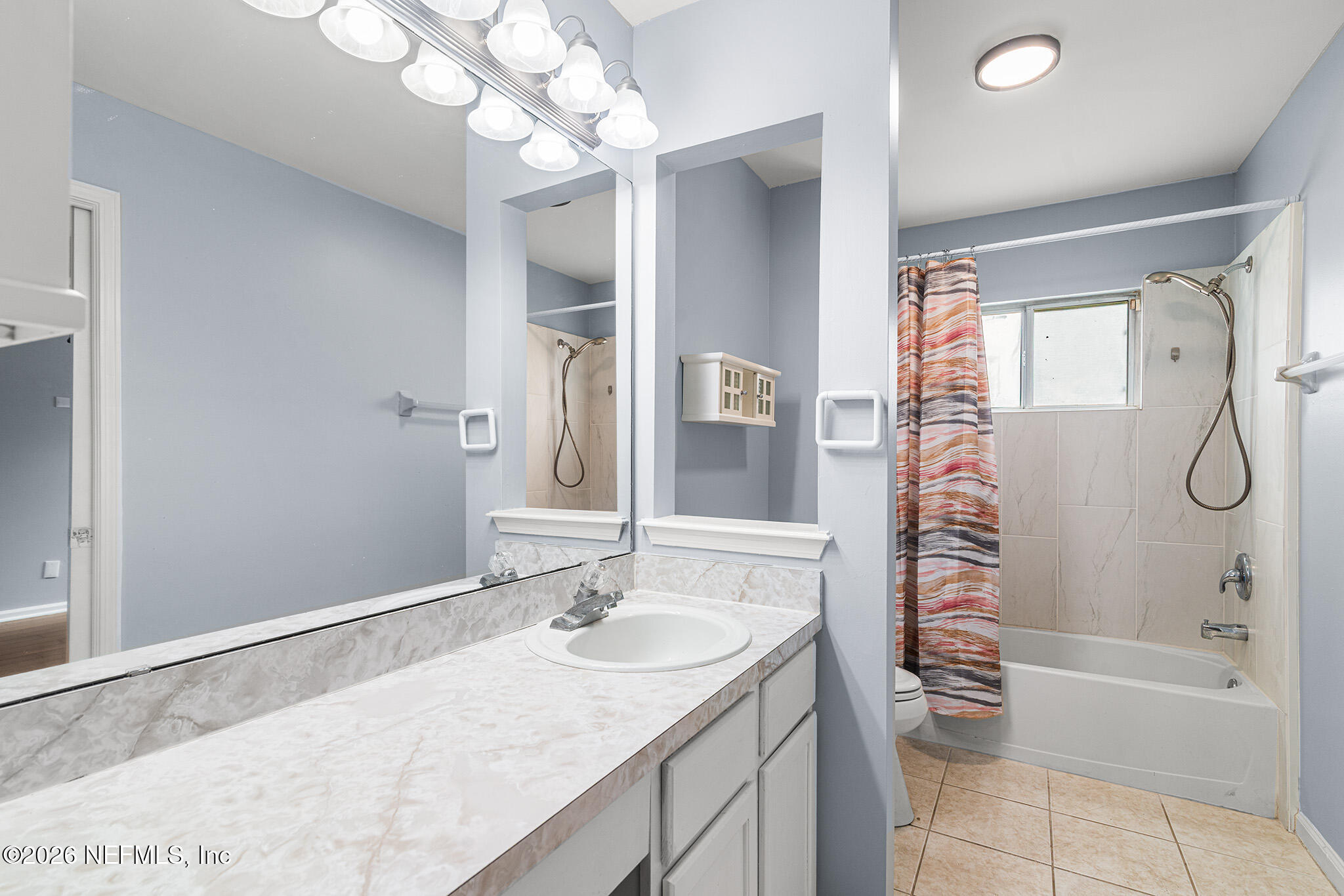 2020 Merced Court Jacksonville, FL 32224 - Photo 17 of 29 a bathroom with a granite countertop sink a toilet and shower