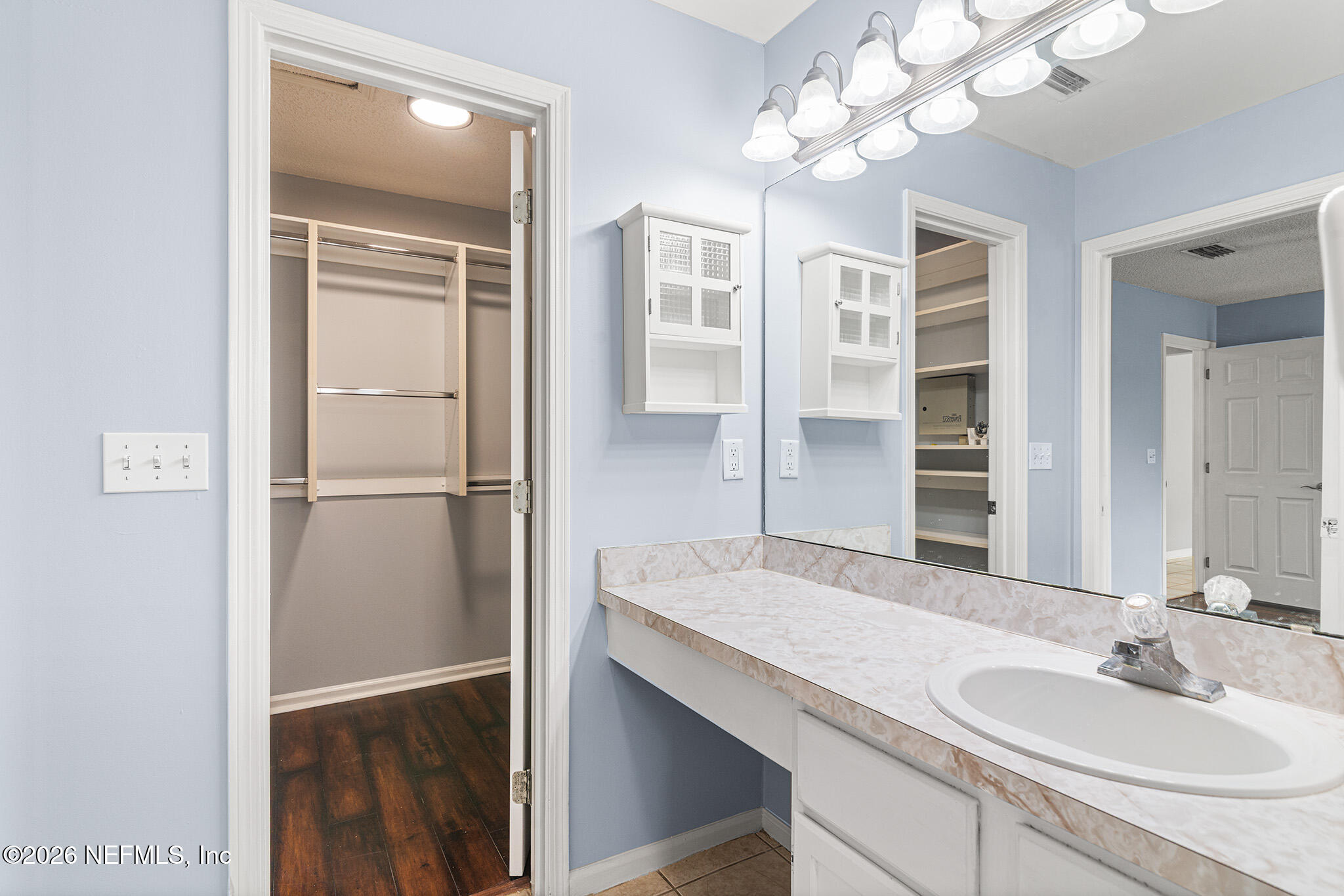 2020 Merced Court Jacksonville, FL 32224 - Photo 18 of 29 a bathroom with a sink double vanity and a shower