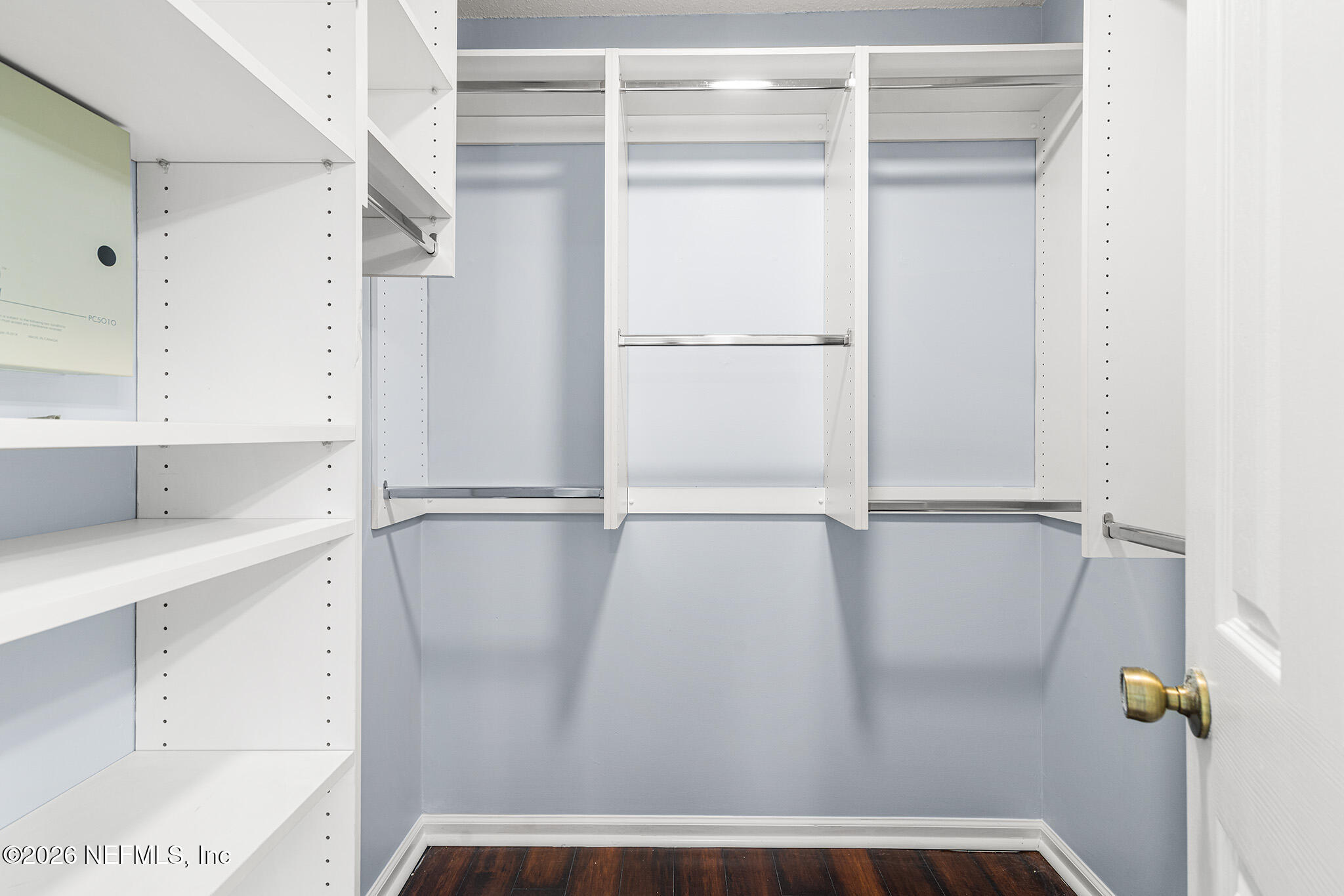 2020 Merced Court Jacksonville, FL 32224 - Photo 19 of 29 a view of walk in closet with empty racks