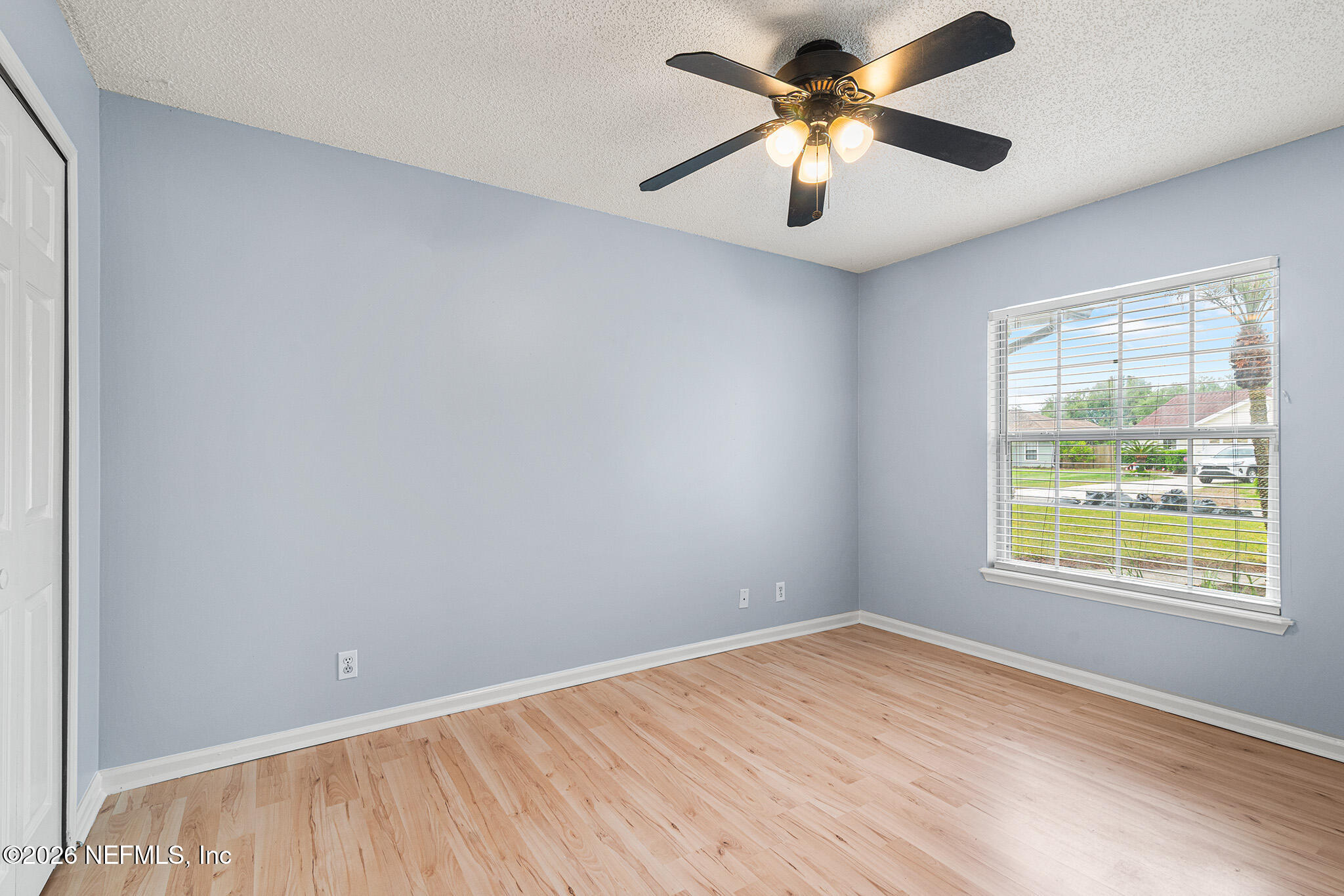 2020 Merced Court Jacksonville, FL 32224 - Photo 20 of 29 an empty room with windows and fan