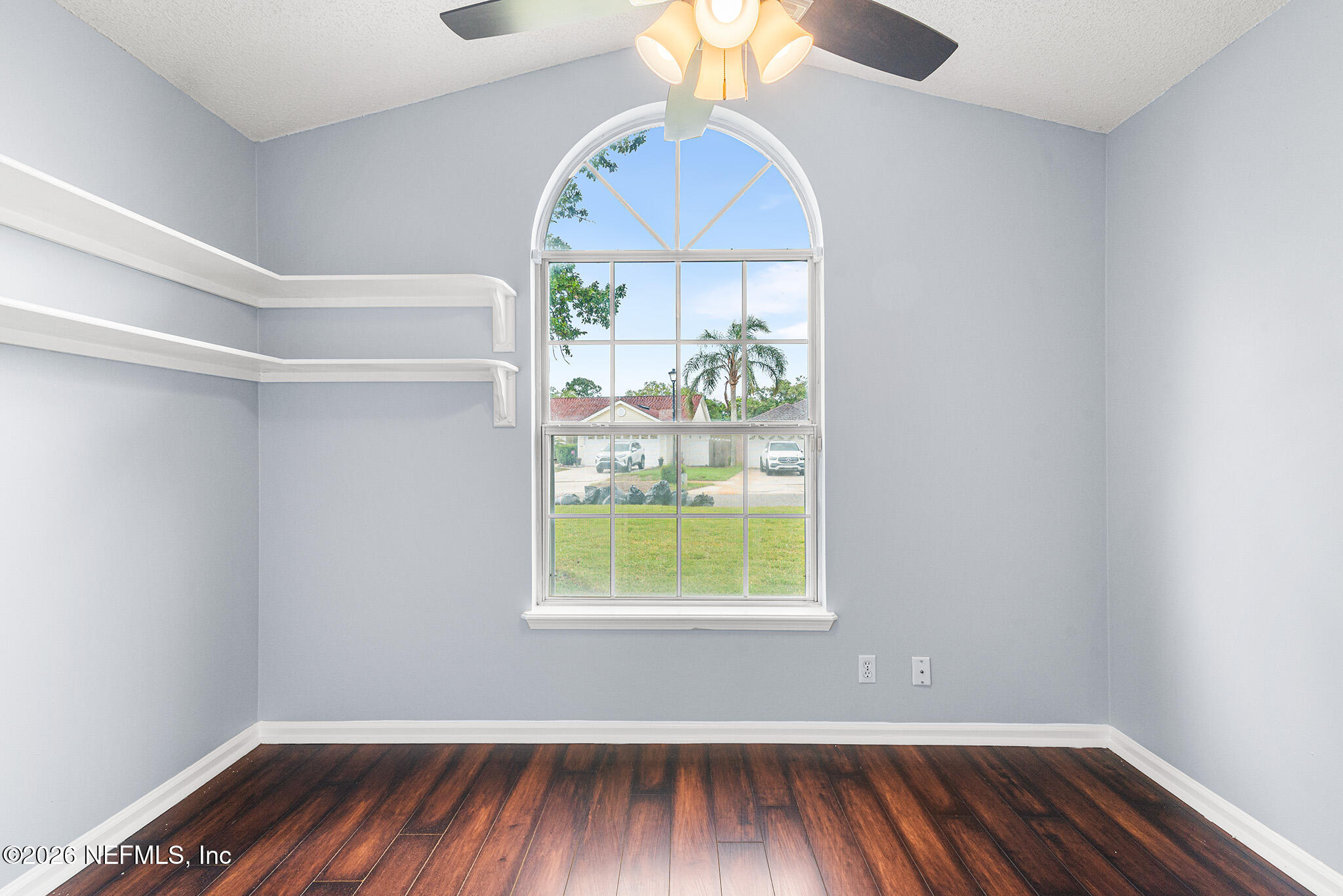 2020 Merced Court Jacksonville, FL 32224 - Photo 6 of 29 wooden floor in an empty room with a window
