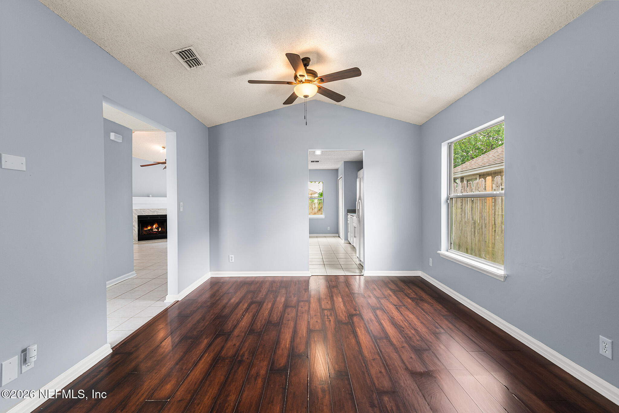 2020 Merced Court Jacksonville, FL 32224 - Photo 7 of 29 a view of empty room with wooden floor and fan
