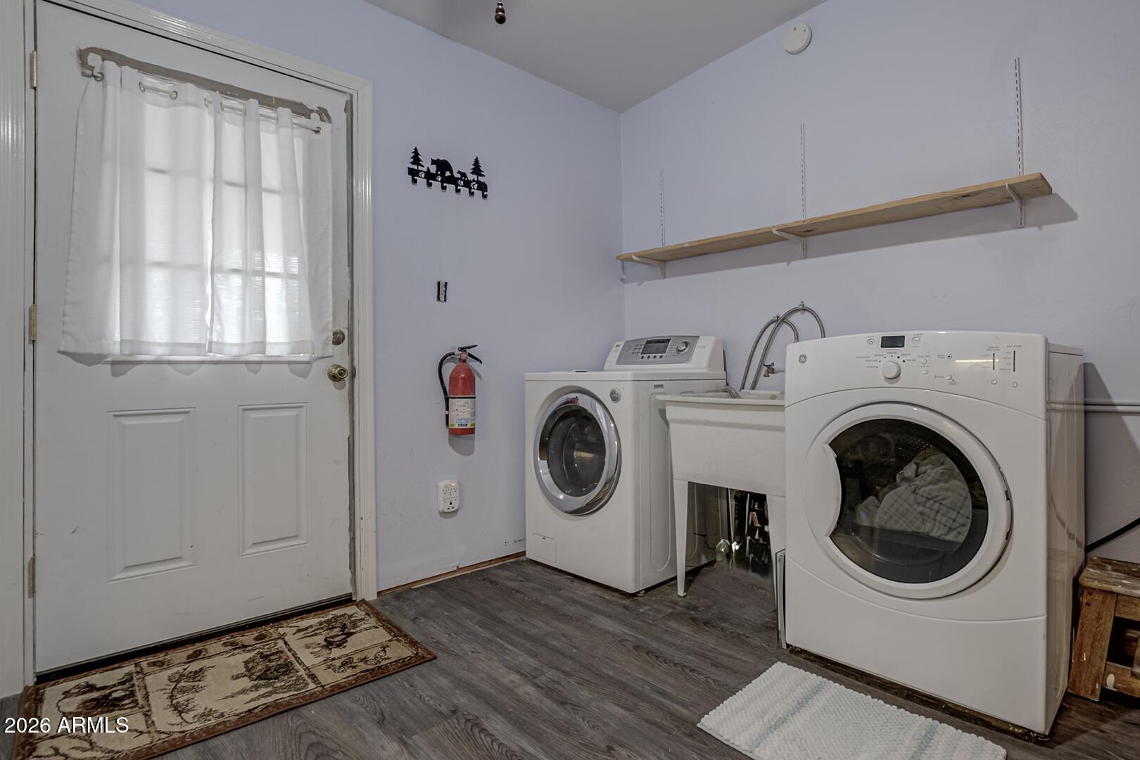 4120 North Whispering Pine Road Pine, AZ 85544 - Photo 11 of 30 a utility room with dryer and washer