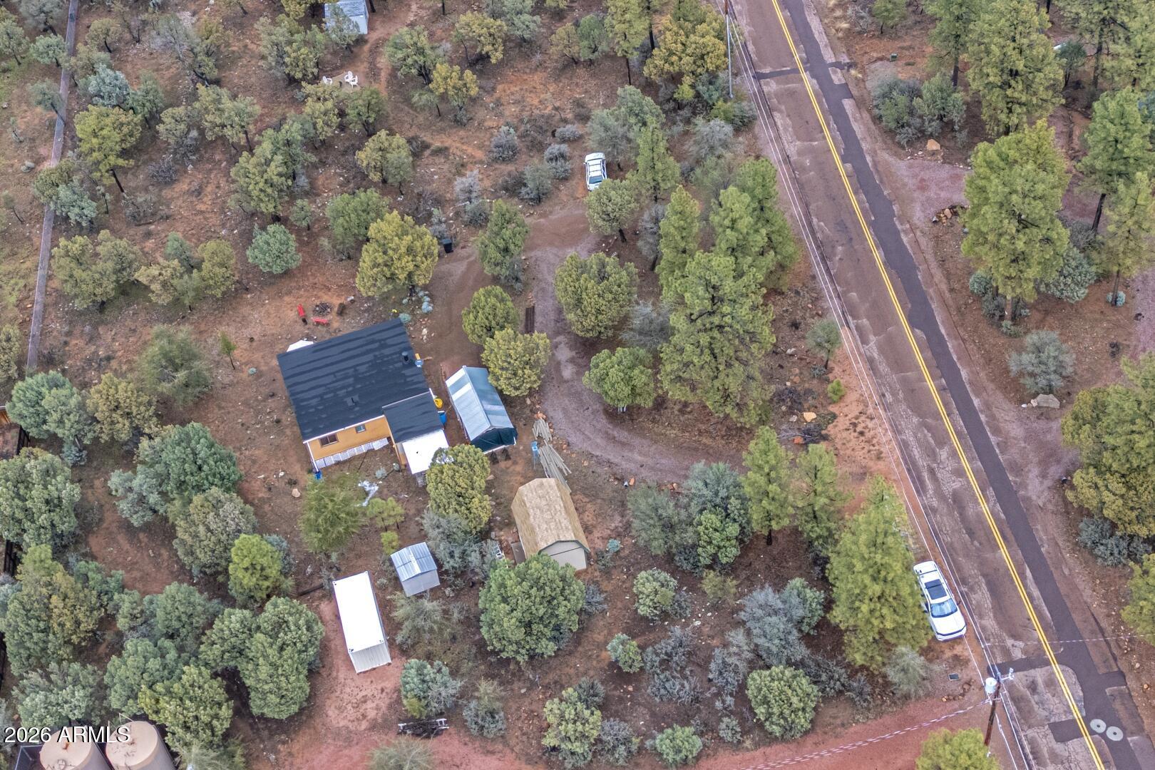 4120 North Whispering Pine Road Pine, AZ 85544 - Photo 24 of 30 an aerial view of house with outdoor space
